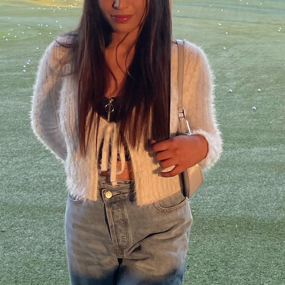 White open front sweater
